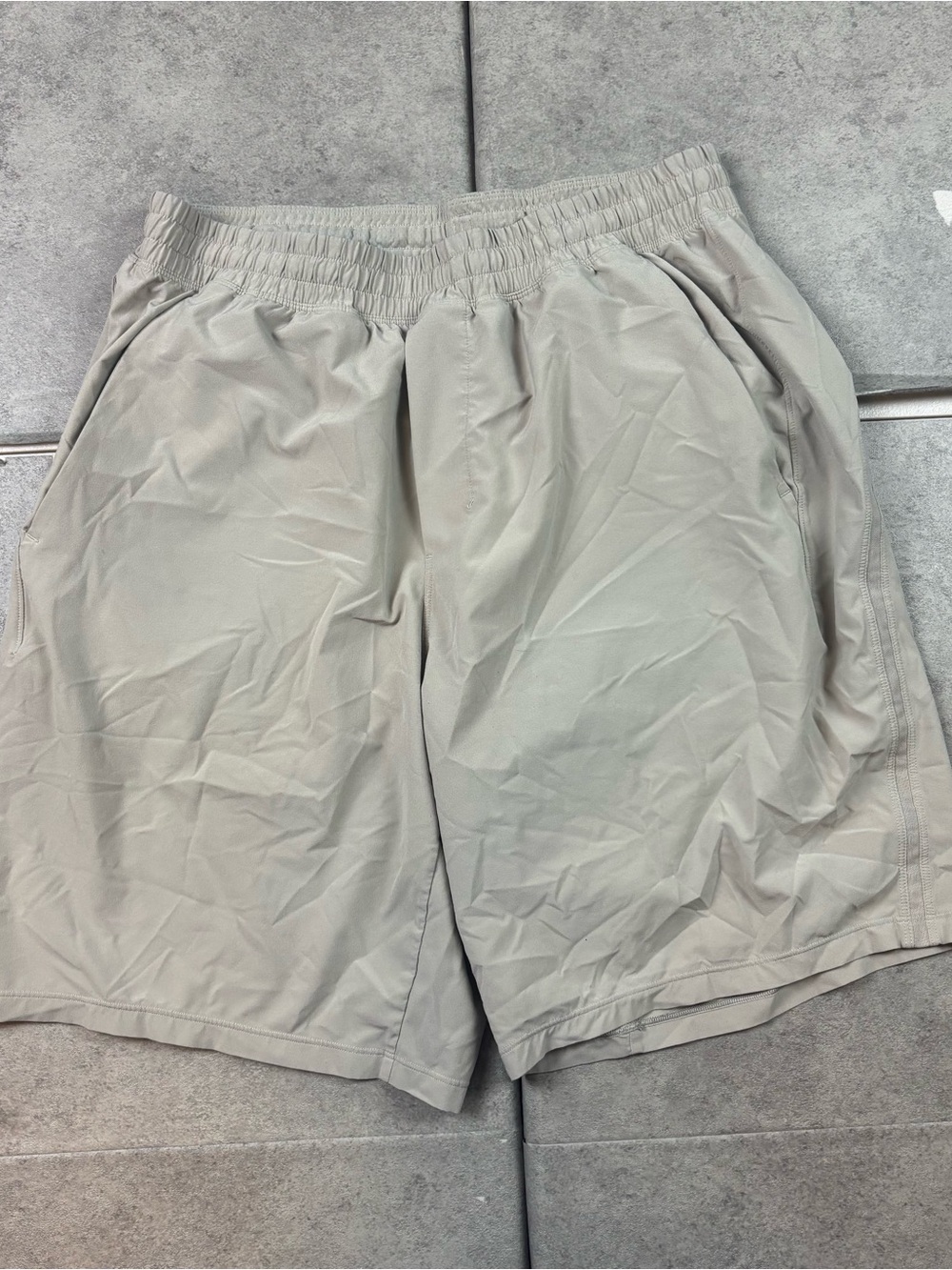 Tan lululemon pace breaker linerless shorts 9”inseam large